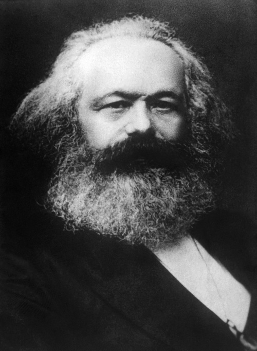Fotografia de Karl Marx com barba volumosa e grisalha, em preto e branco.